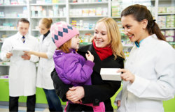 customer assisted by a pharmacist